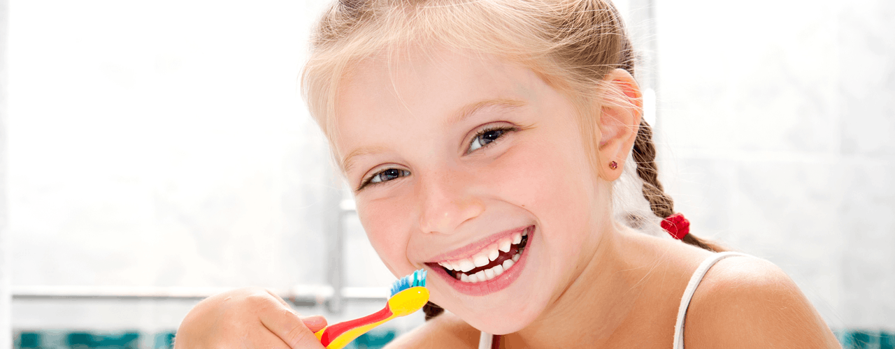 Child brushing teeth